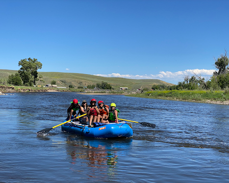 group of young river users following basic river etiquette